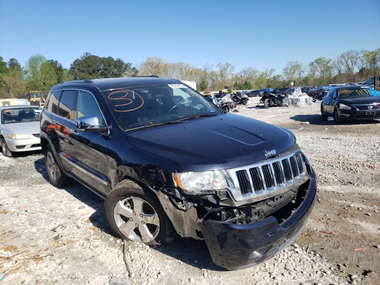 JEEP GRAND CHER 2011 with VIN 1J4RR5GG1BC541437 - Photo from auction