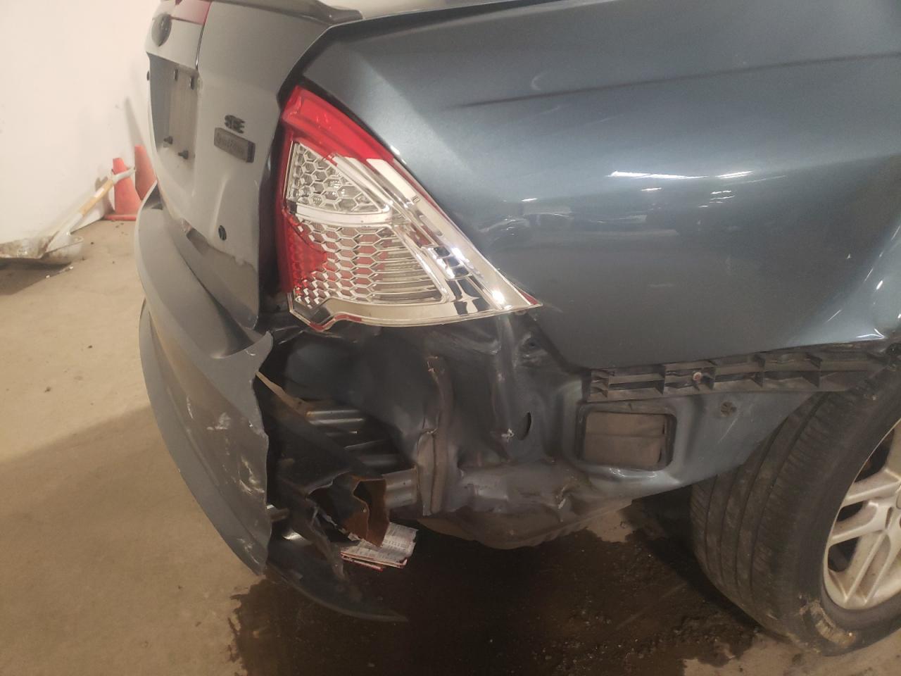 Photo 9 from auction – 2011 FORD FUSION SE with VIN 3FAHP0HA1BR136674