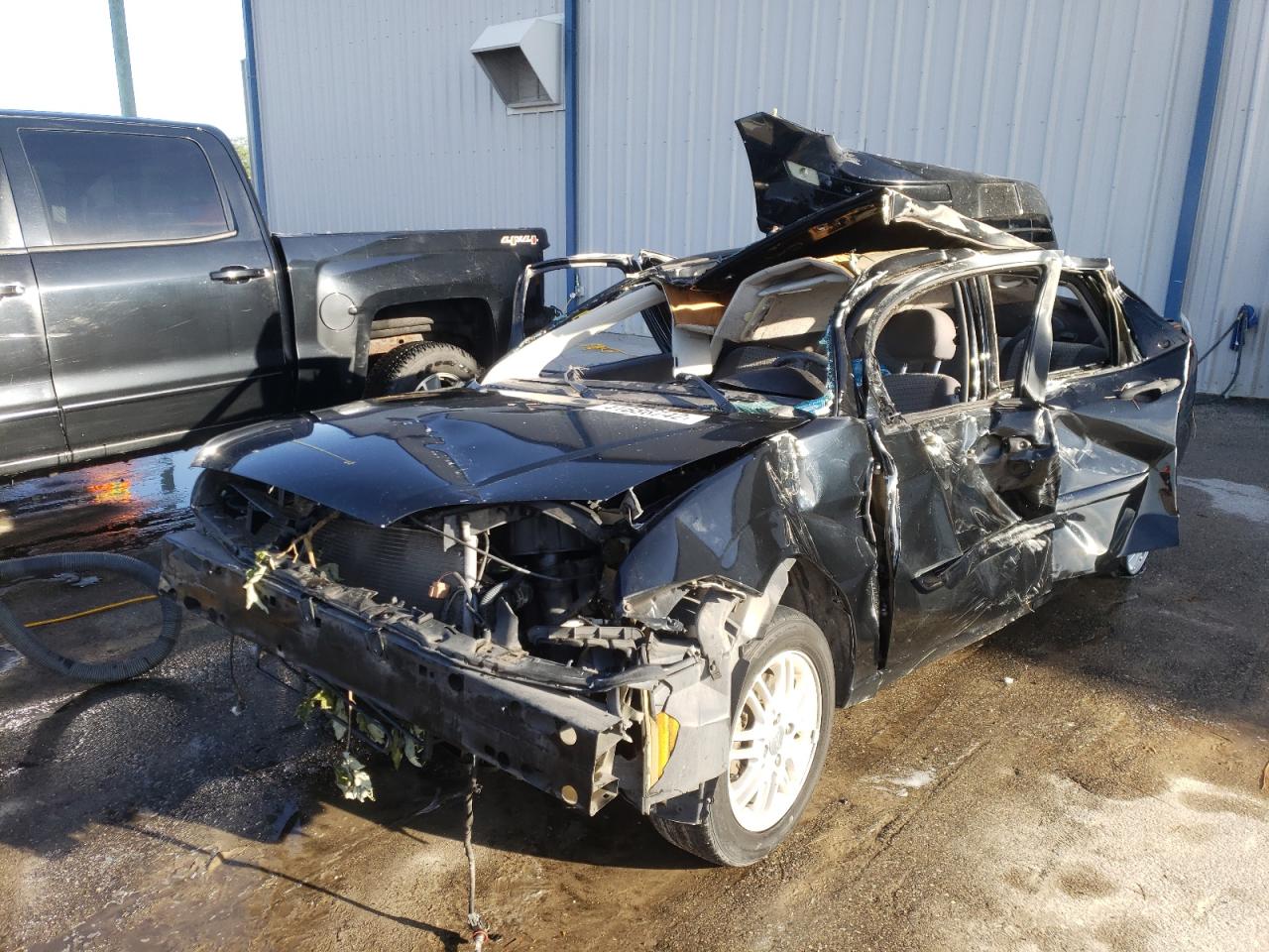 Photo 2 from auction – 2006 FORD FOCUS ZX4 with VIN 1FAFP34N36W123493