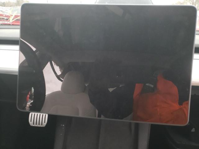Photo 8 from auction – 2021 TESLA MODEL 3 with VIN 5YJ3E1EC5MF044638