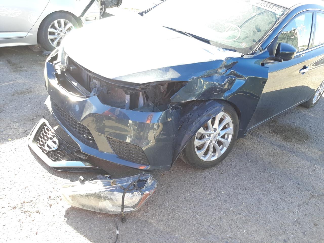Photo 9 from auction – 2016 NISSAN SENTRA S with VIN 3N1AB7AP1GY308705