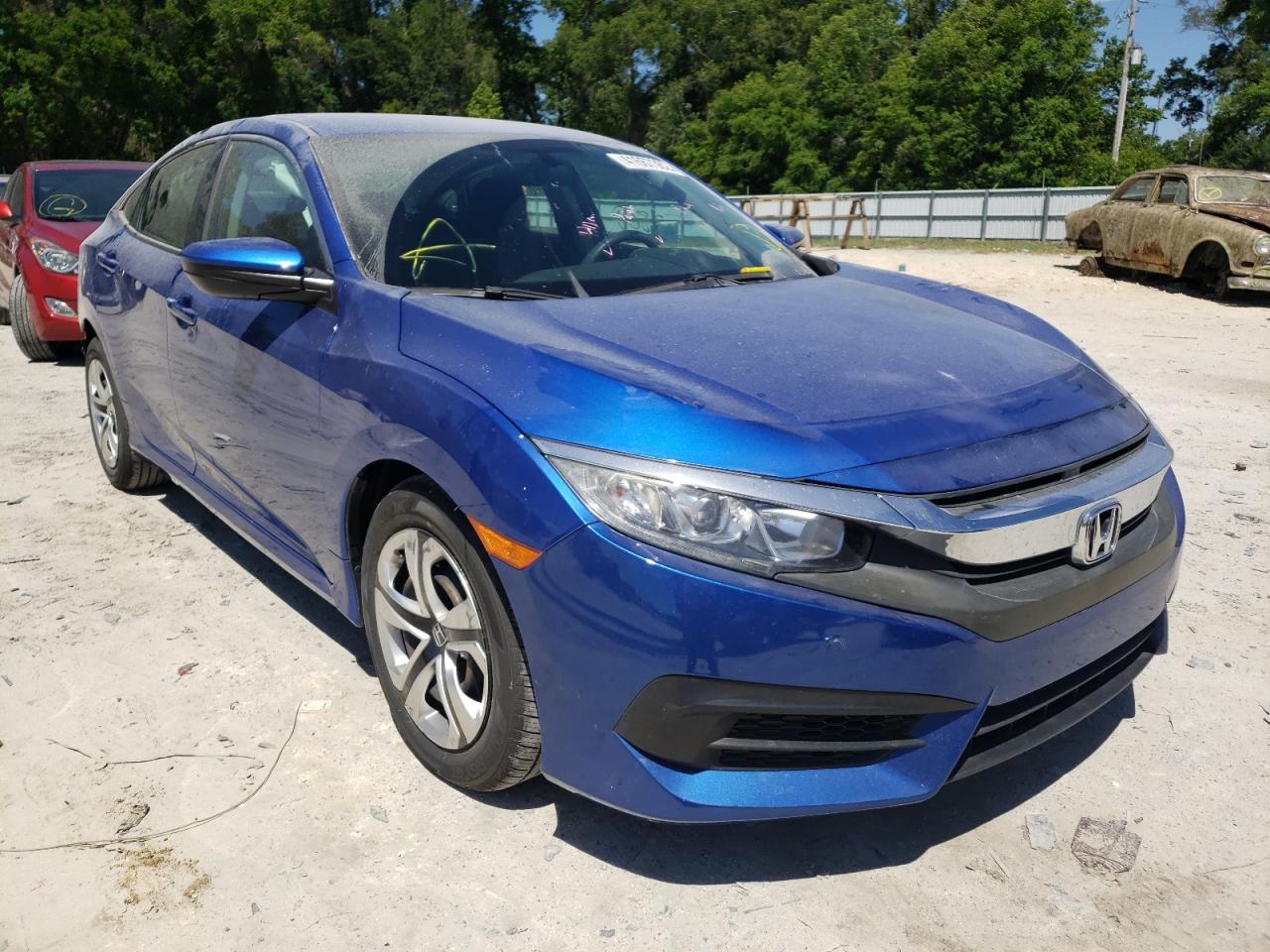 Photo 1 from auction – 2018 HONDA CIVIC LX with VIN 19XFC2F59JE003651