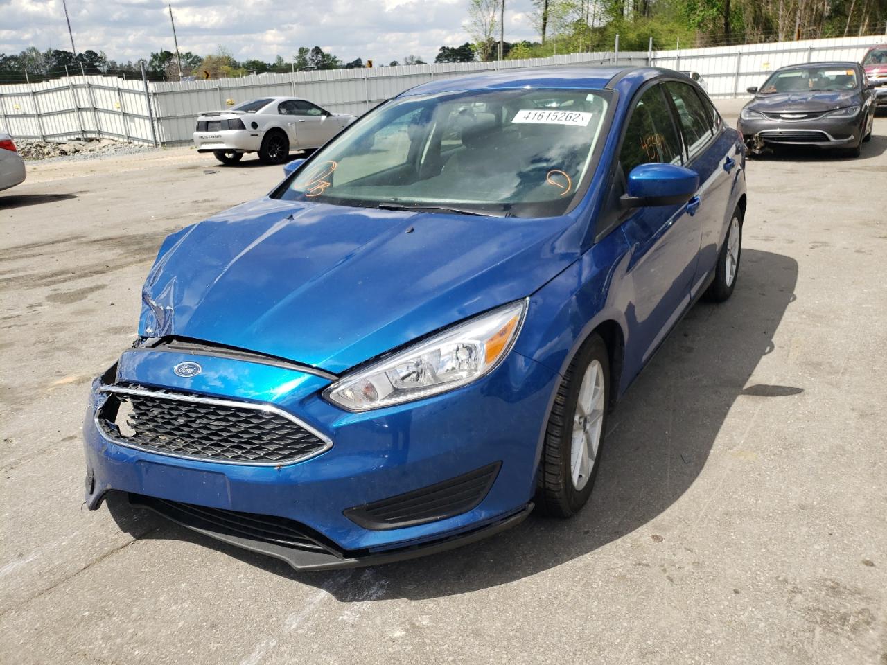 Photo 2 from auction – 2018 FORD FOCUS SE with VIN 1FADP3F24JL220156