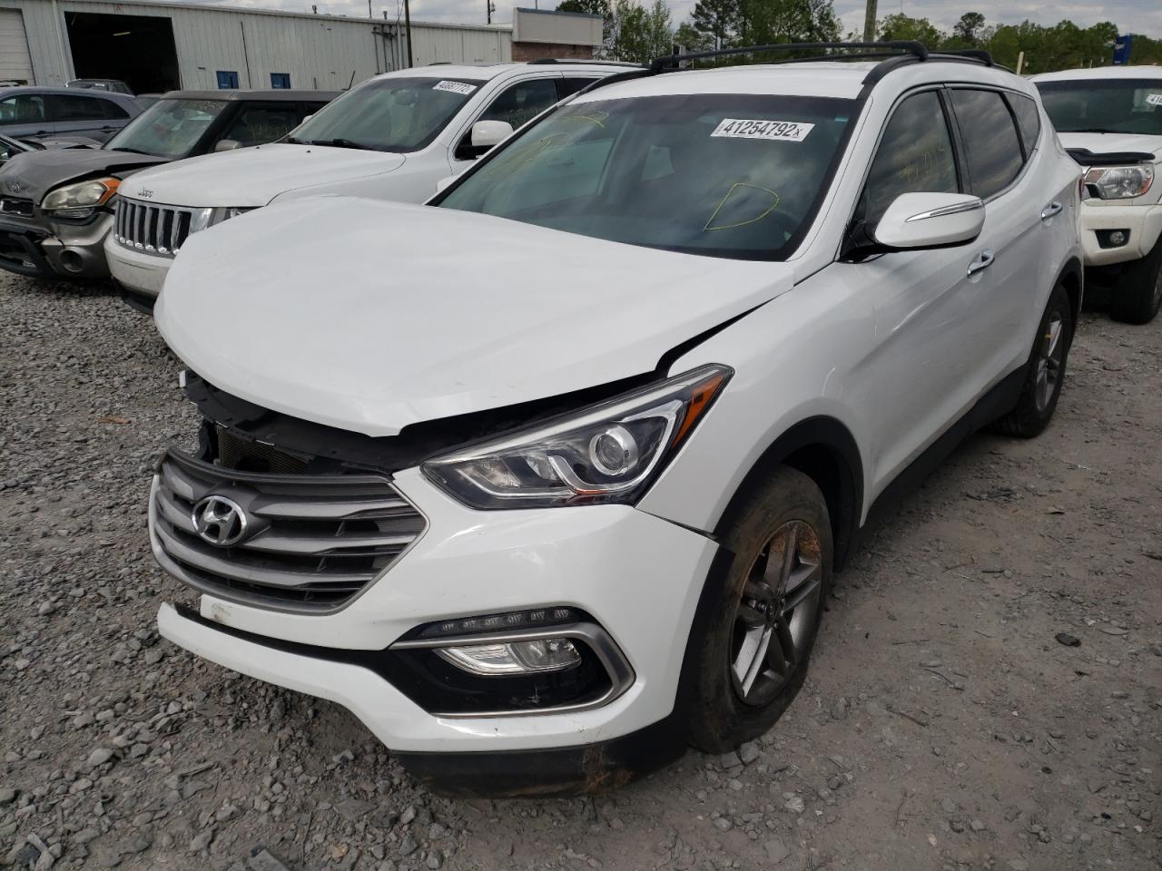 Photo 2 from auction – 2017 HYUNDAI SANTA FE S with VIN 5NMZU3LB8HH002746