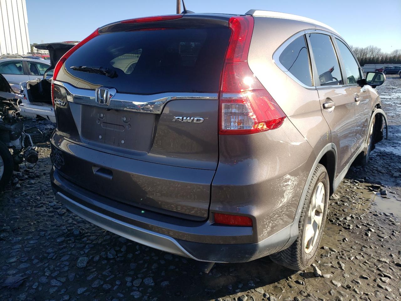 Photo 4 from auction – 2016 HONDA CR-V with VIN 2HKRM4H75GH690930