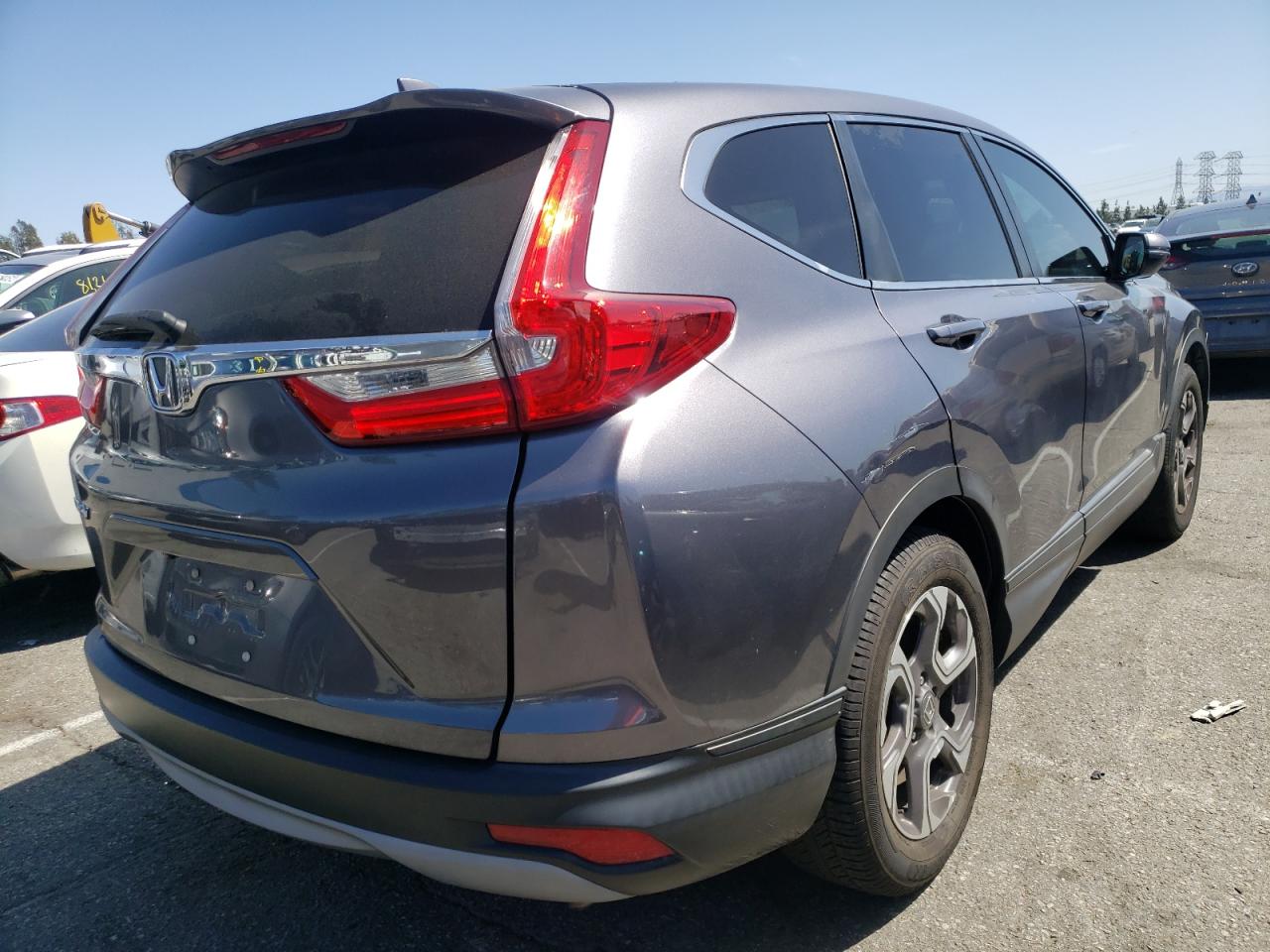 Photo 4 from auction – 2017 HONDA CR-V EX with VIN 7FARW1H54HE031149