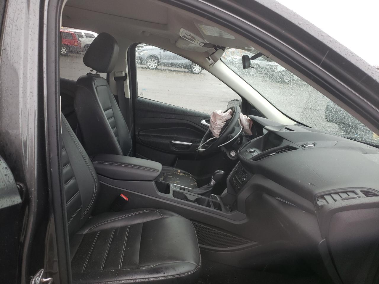Photo 5 from auction – 2017 FORD ESCAPE SE with VIN 1FMCU0G91HUD37864