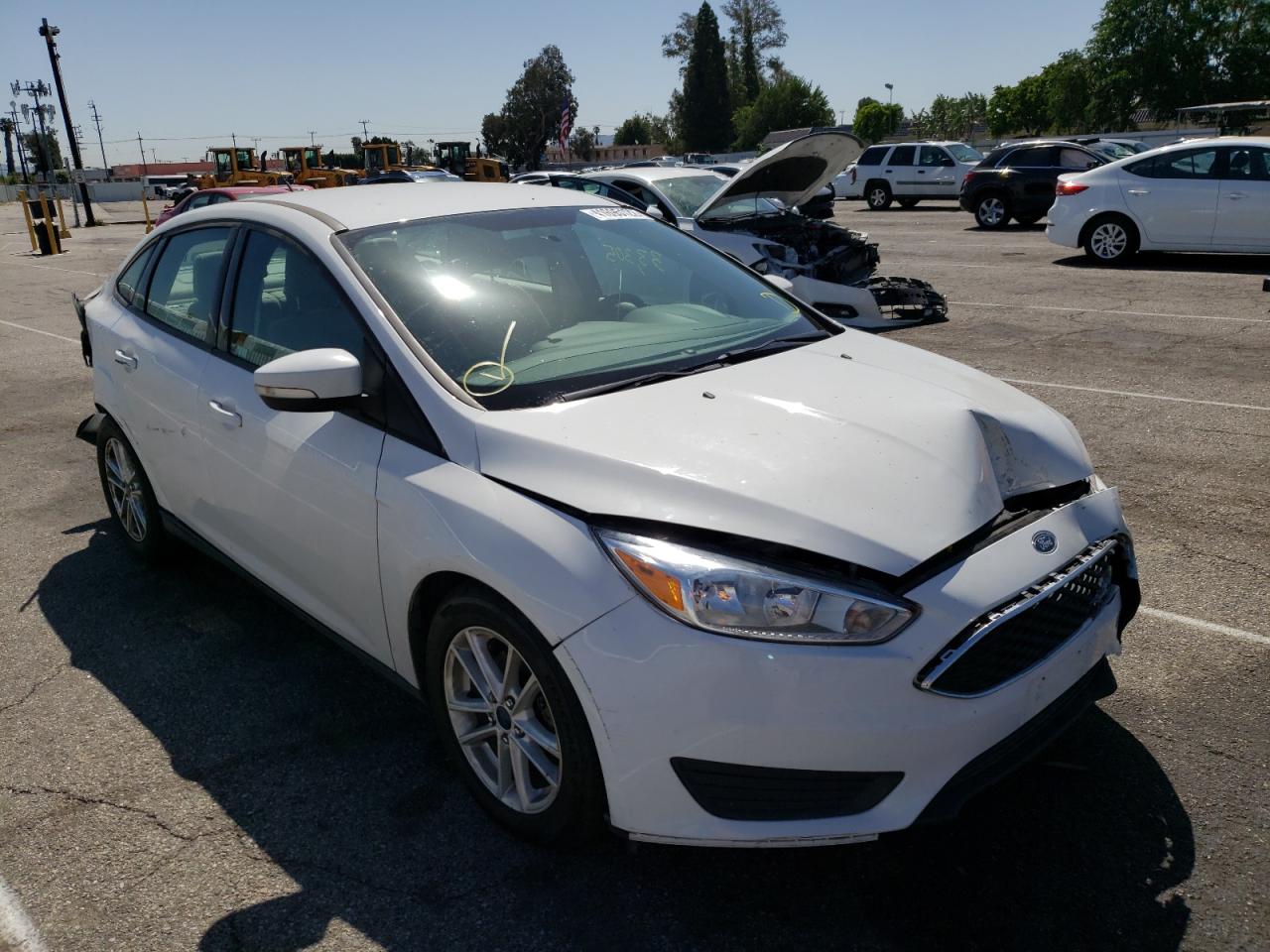 FORD FOCUS SE 2016 with VIN 1FADP3F21GL209480 - Photo from auction