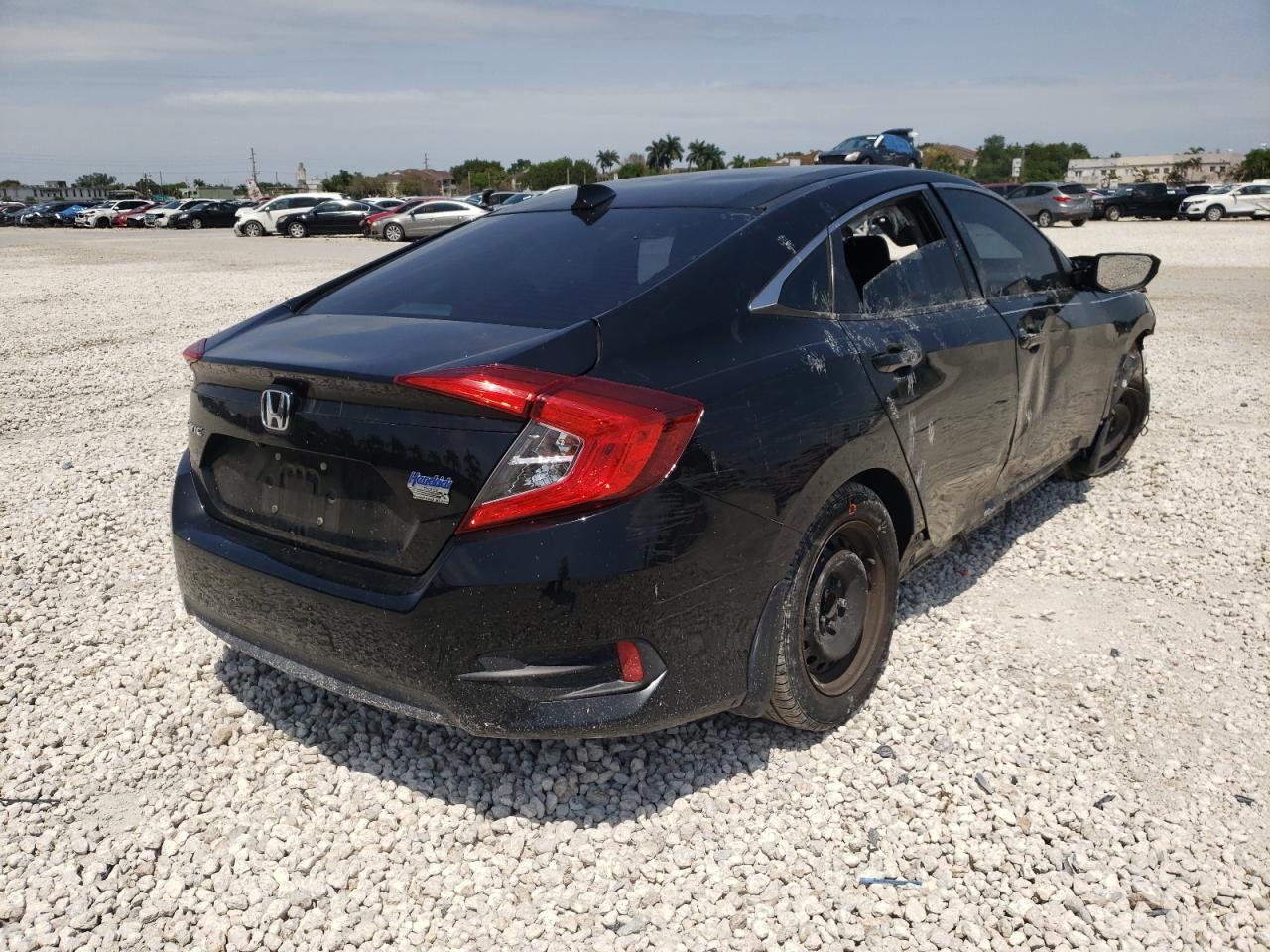 Photo 4 from auction – 2016 HONDA CIVIC LX with VIN 2HGFC2F59GH509690