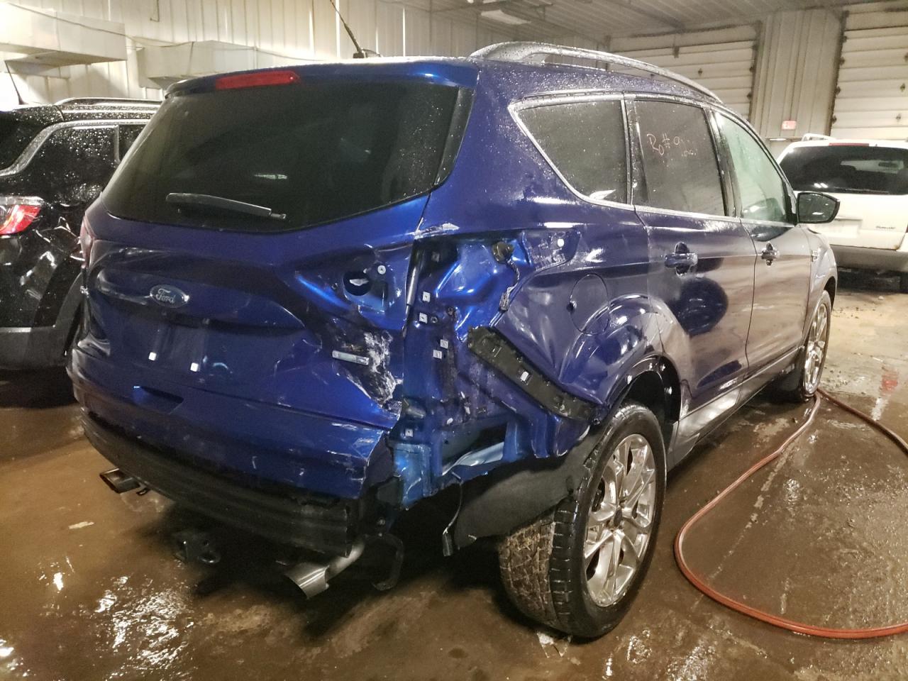 Photo 4 from auction – 2016 FORD ESCAPE SE with VIN 1FMCU9G98GUB54528