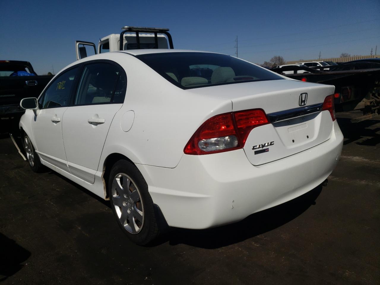 Photo 3 from auction – 2011 HONDA CIVIC LX with VIN 19XFA1F53BE031897