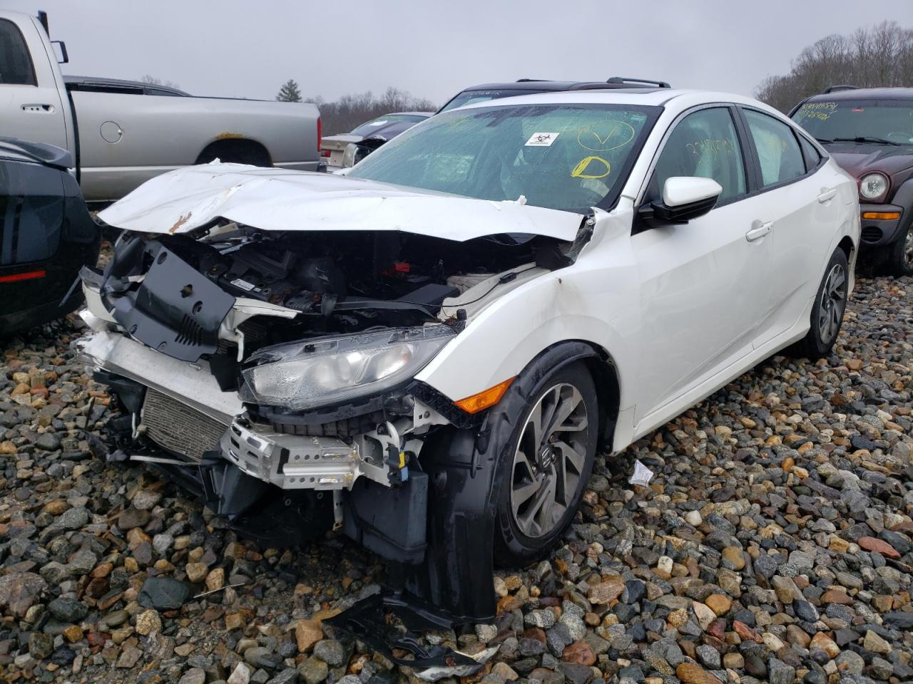 Photo 17 from auction – 2016 HONDA CIVIC EX with VIN 19XFC2F76GE201131