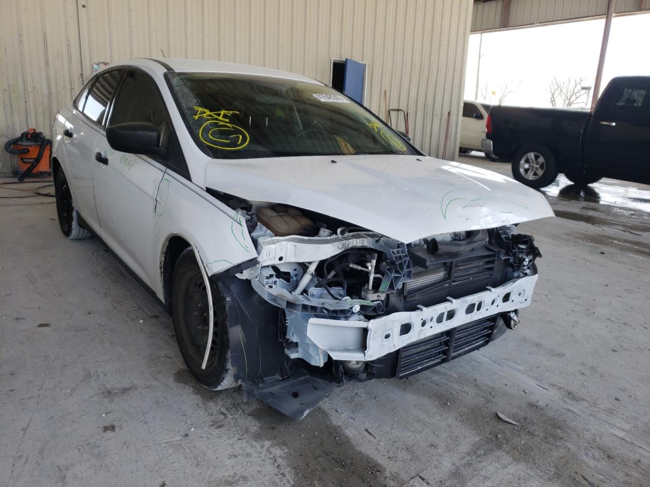 FORD FOCUS S 2016 with VIN 1FADP3E28GL261562 - Photo from auction
