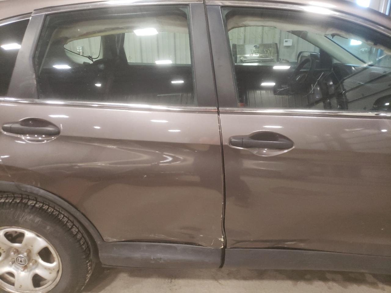 Photo 9 from auction – 2014 HONDA CR-V LX with VIN 2HKRM4H33EH689494