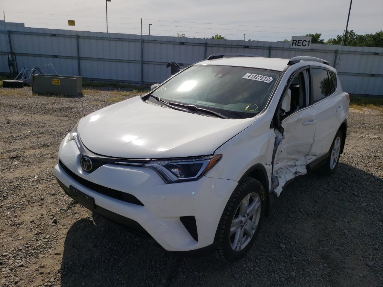 Photo 2 from auction – 2018 TOYOTA RAV4 LE with VIN JTMBFREVXJD226203