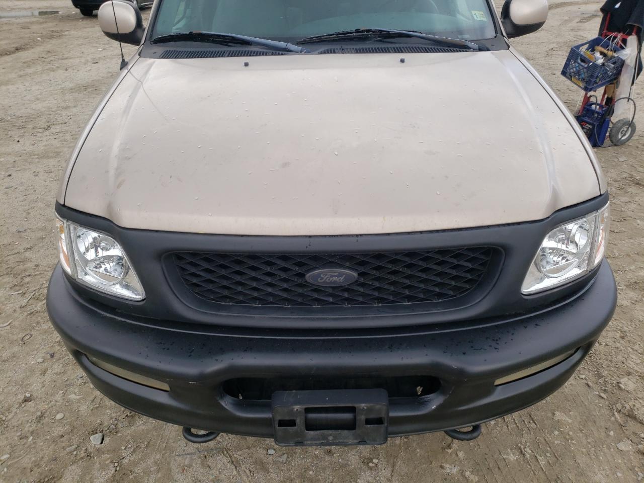 Photo 9 from auction – 1998 FORD F150 with VIN 1FTRX18L3WNB24119