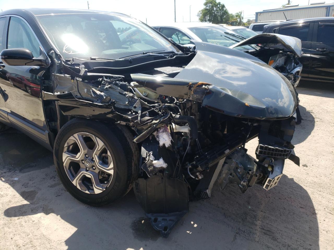 Photo 9 from auction – 2017 HONDA CR-V EXL with VIN 7FARW1H82HE020709