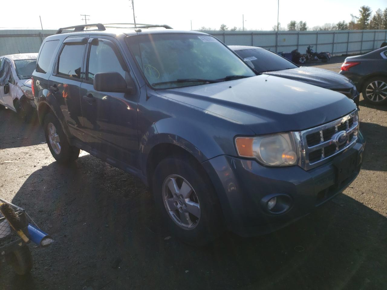 FORD ESCAPE XLT 2011 with VIN 1FMCU0DG2BKC27833 - Photo from auction
