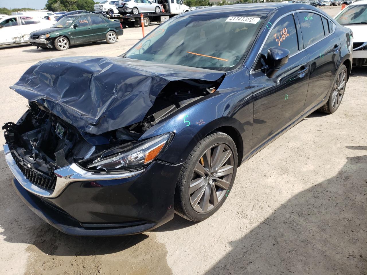 Photo 2 from auction – 2020 MAZDA 6 TOURING with VIN JM1GL1VM8L1517021
