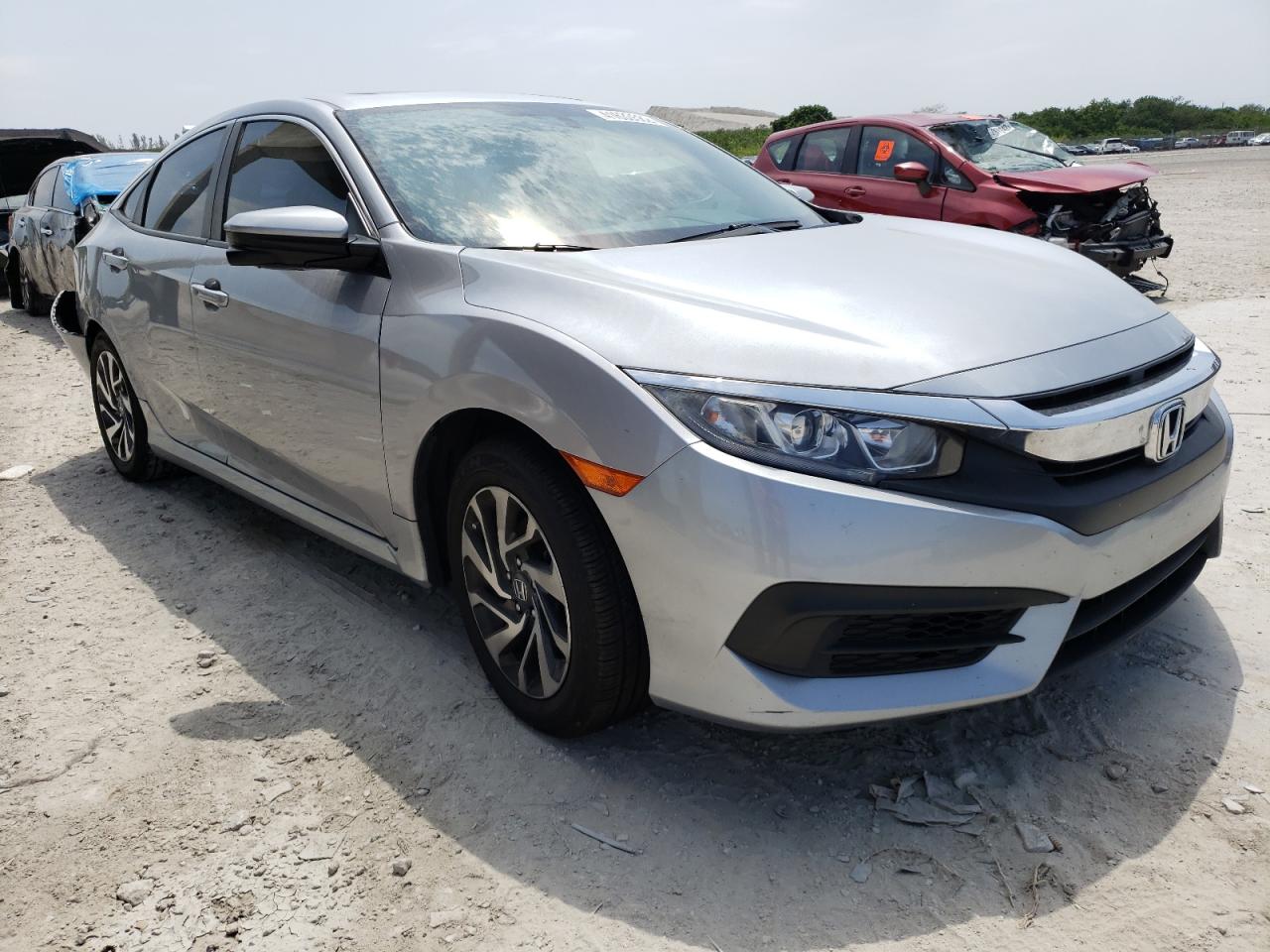 HONDA CIVIC EX 2017 with VIN 19XFC2F71HE056422 - Photo from auction