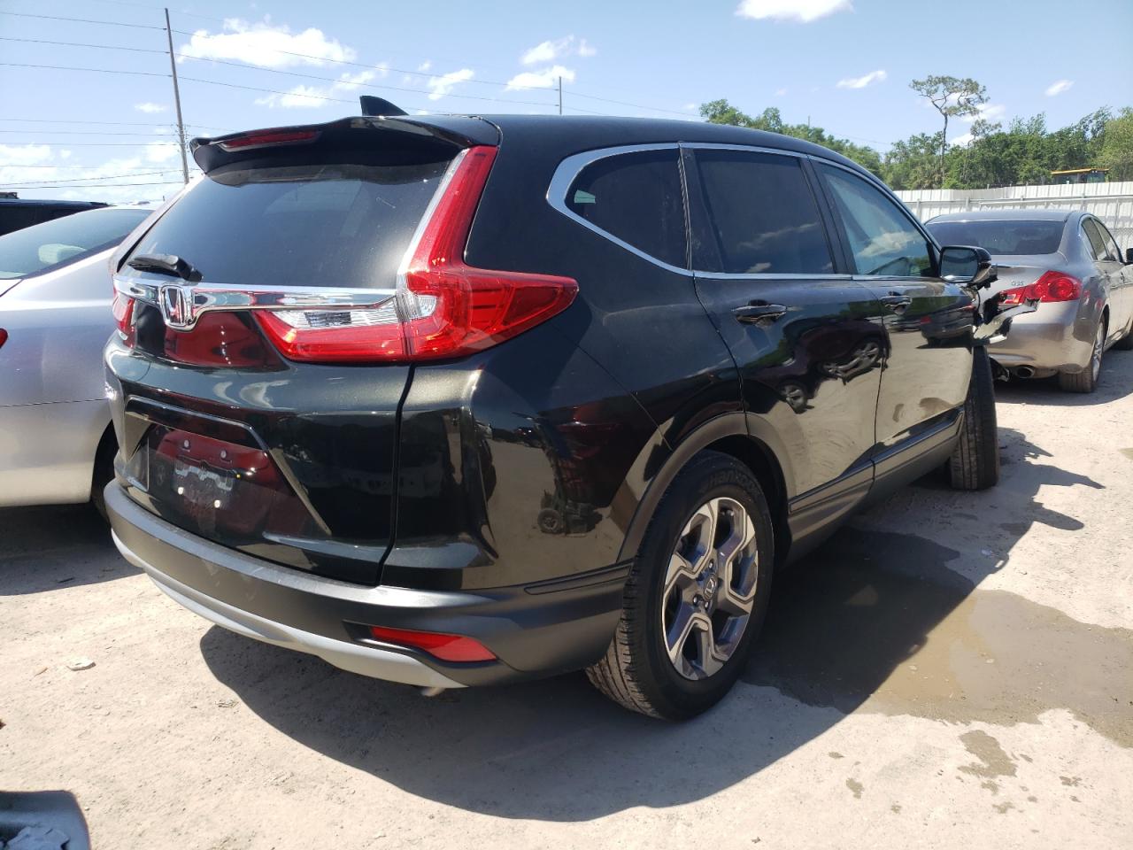 Photo 4 from auction – 2017 HONDA CR-V EXL with VIN 7FARW1H82HE020709
