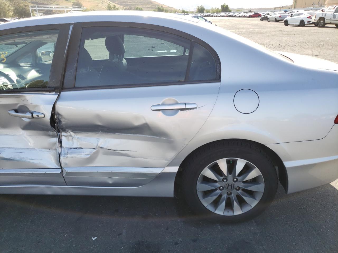 Photo 10 from auction – 2011 HONDA CIVIC EX with VIN 19XFA1F87BE022047