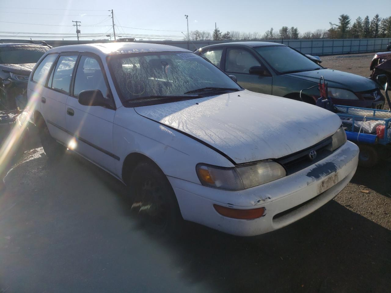 TOYOTA COROLLA 1993 with VIN JT2AE09W1P0036957 - Photo from auction