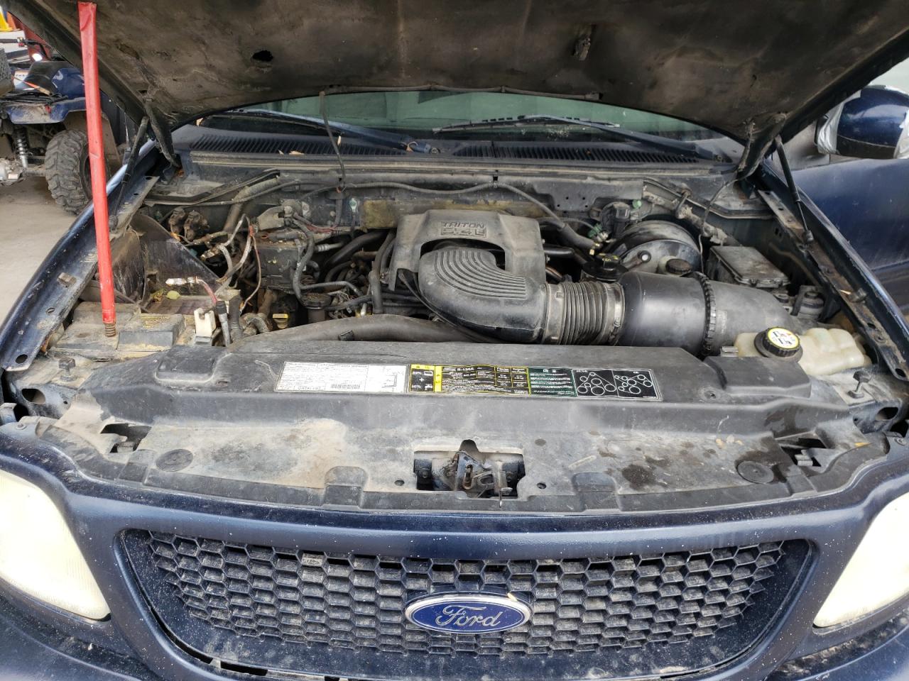Photo 7 from auction – 2003 FORD F150 SUPER with VIN 1FTRW08L53KB58573