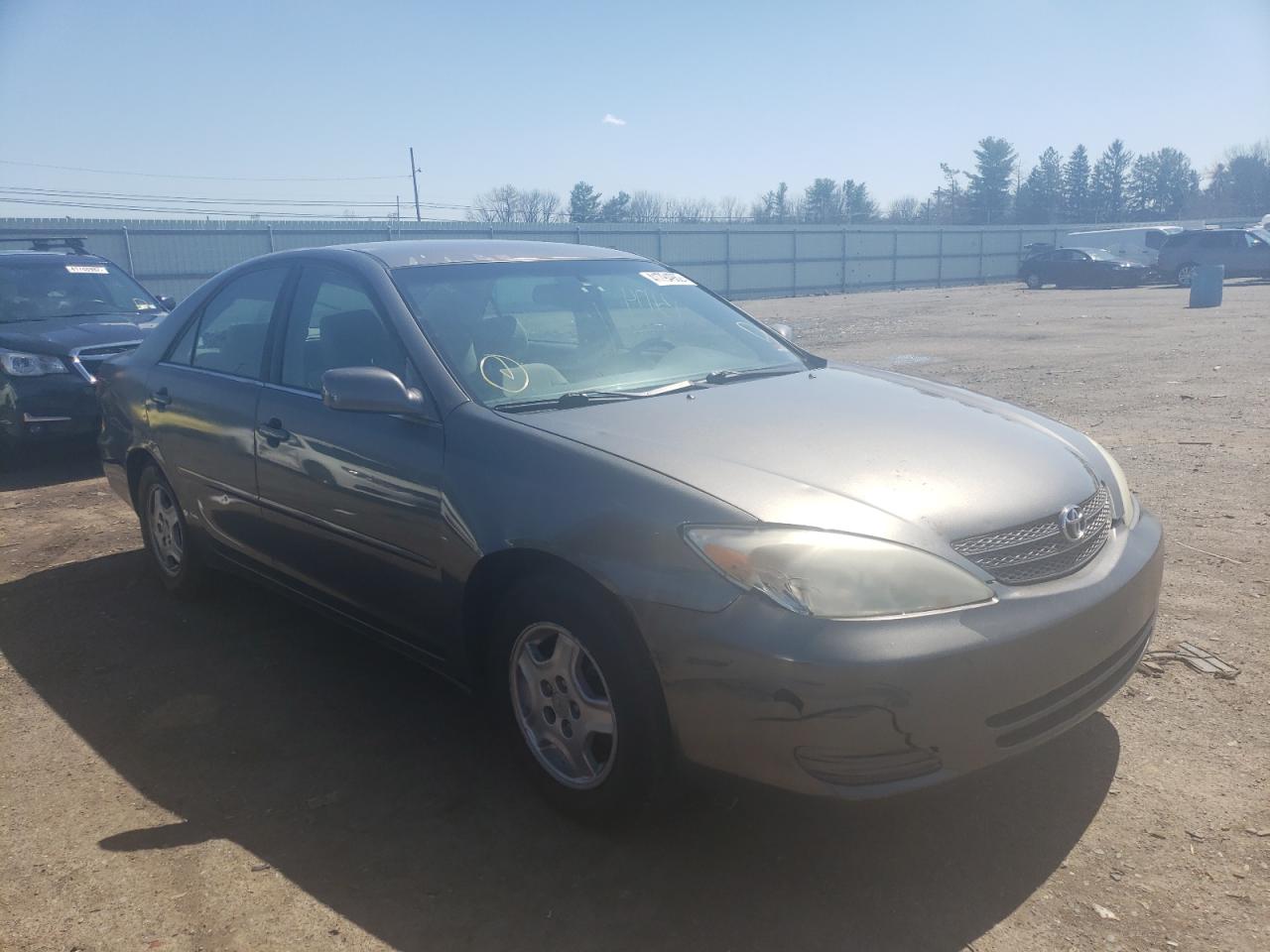 TOYOTA CAMRY LE 2002 with VIN 4T1BF32K52U509452 - Photo from auction