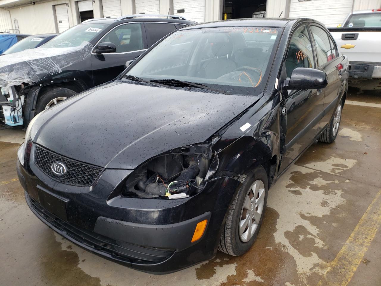 Photo 2 from auction – 2009 KIA RIO BASE with VIN KNADE223396523882