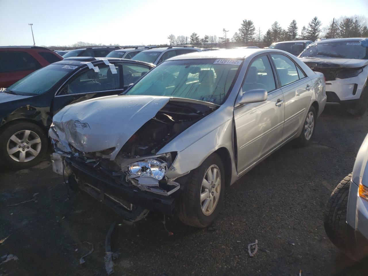 Photo 2 from auction – 2003 TOYOTA CAMRY LE with VIN 4T1BF30KX3U060693