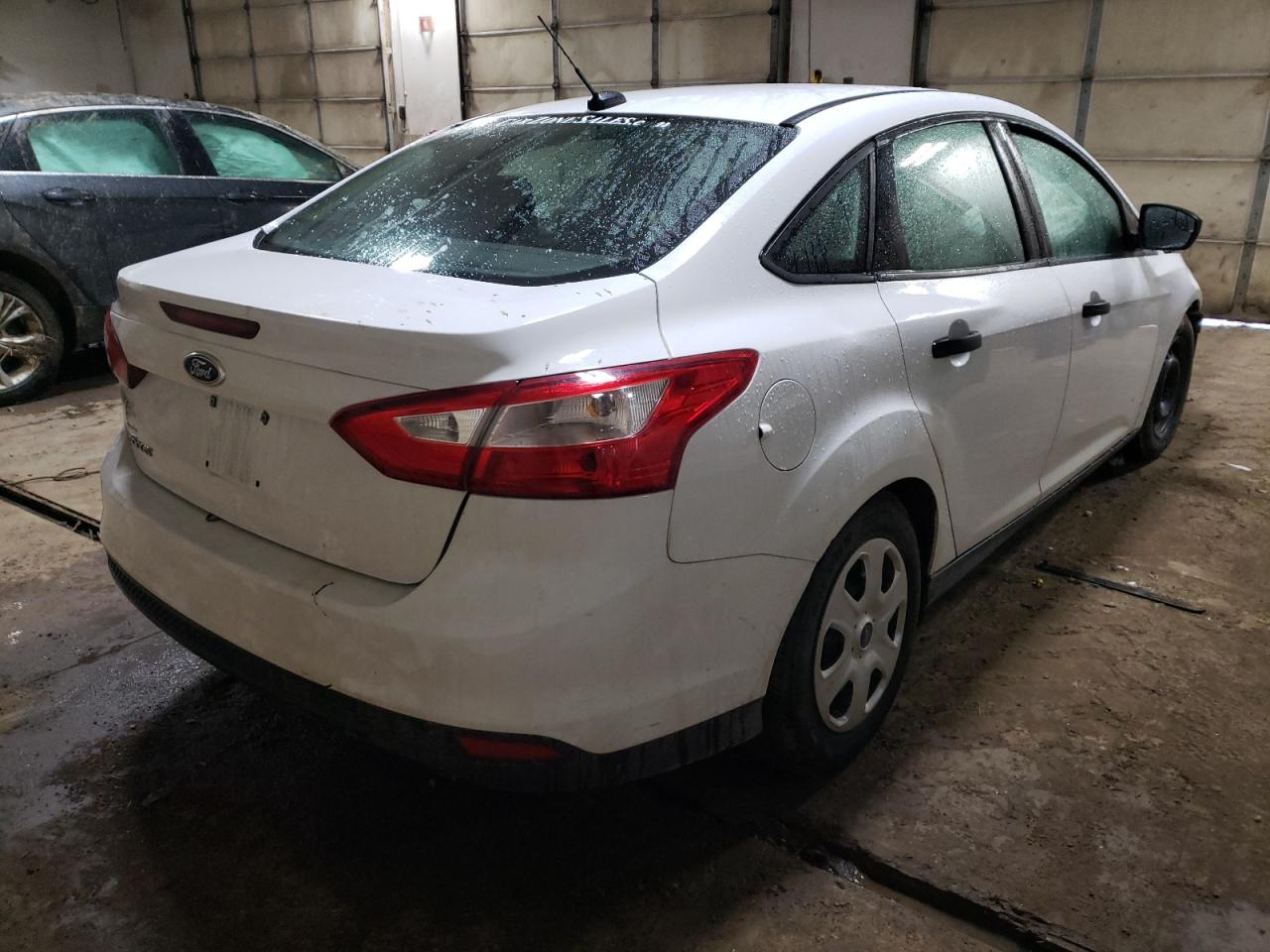 Photo 4 from auction – 2014 FORD FOCUS S with VIN 1FADP3E22EL256046
