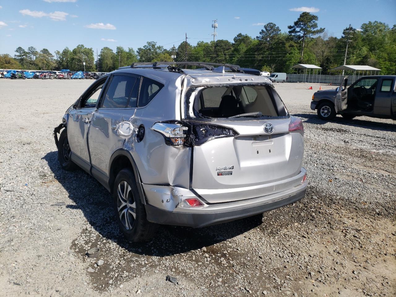Photo 3 from auction – 2018 TOYOTA RAV4 LE with VIN JTMZFREV0JD121748