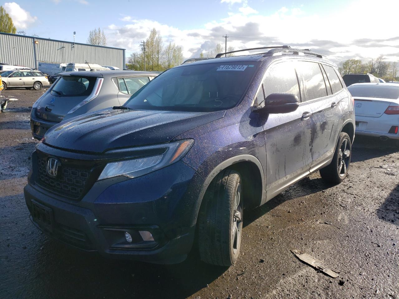 Photo 2 from auction – 2019 HONDA PASSPORT E with VIN 5FNYF8H0XKB001097