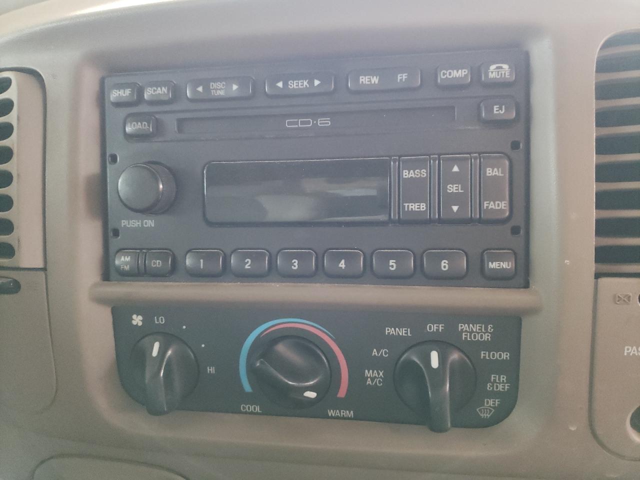 Photo 9 from auction – 2004 FORD F-150 HERI with VIN 2FTRX17284CA33763