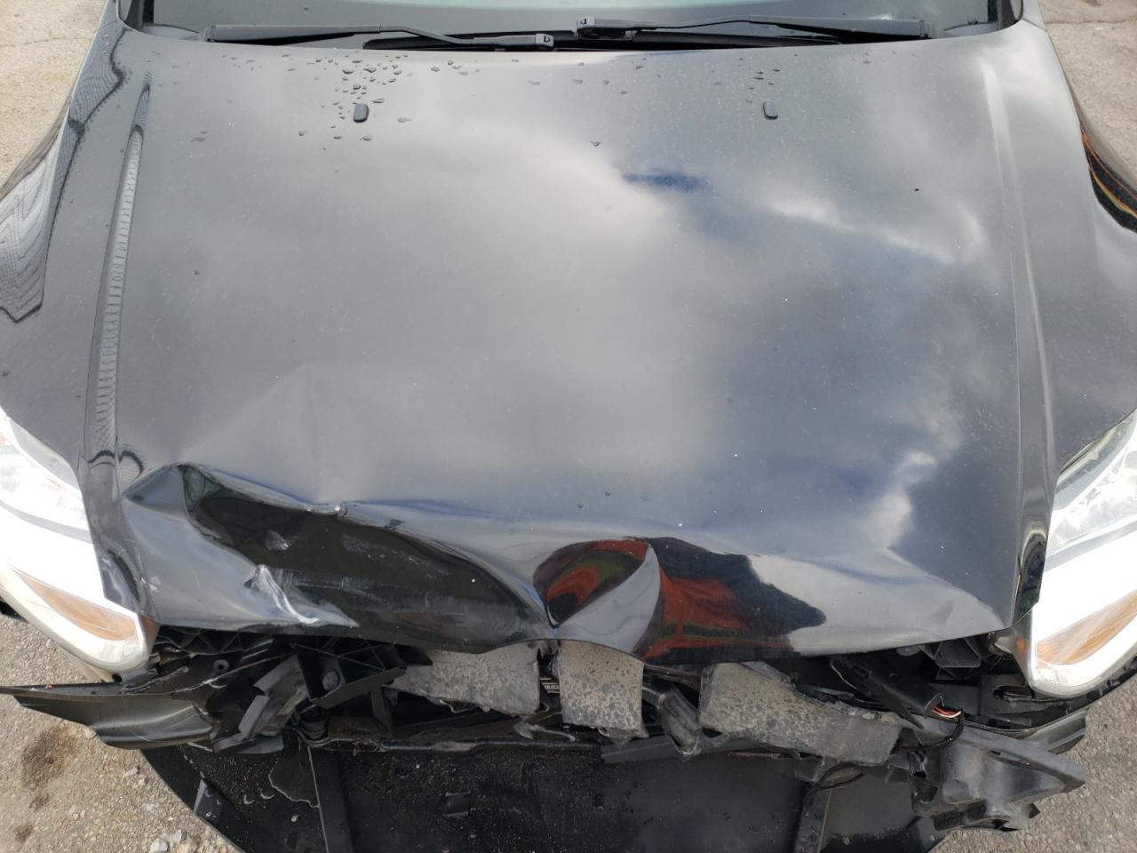 Photo 7 from auction – 2014 FORD FOCUS S with VIN 1FADP3E21EL228609