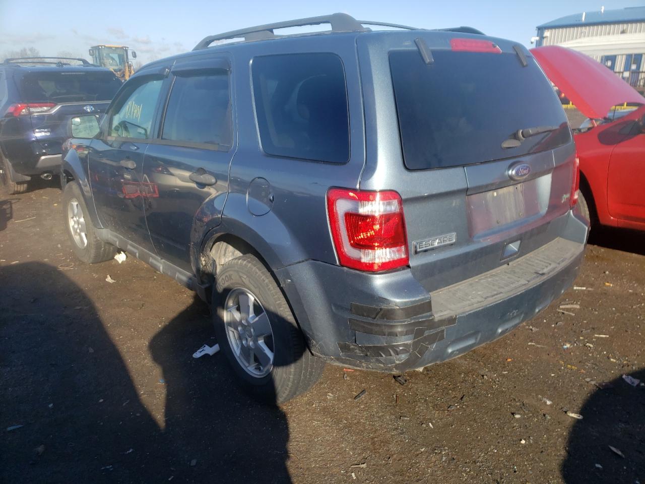 Photo 3 from auction – 2011 FORD ESCAPE XLT with VIN 1FMCU0DG2BKC27833