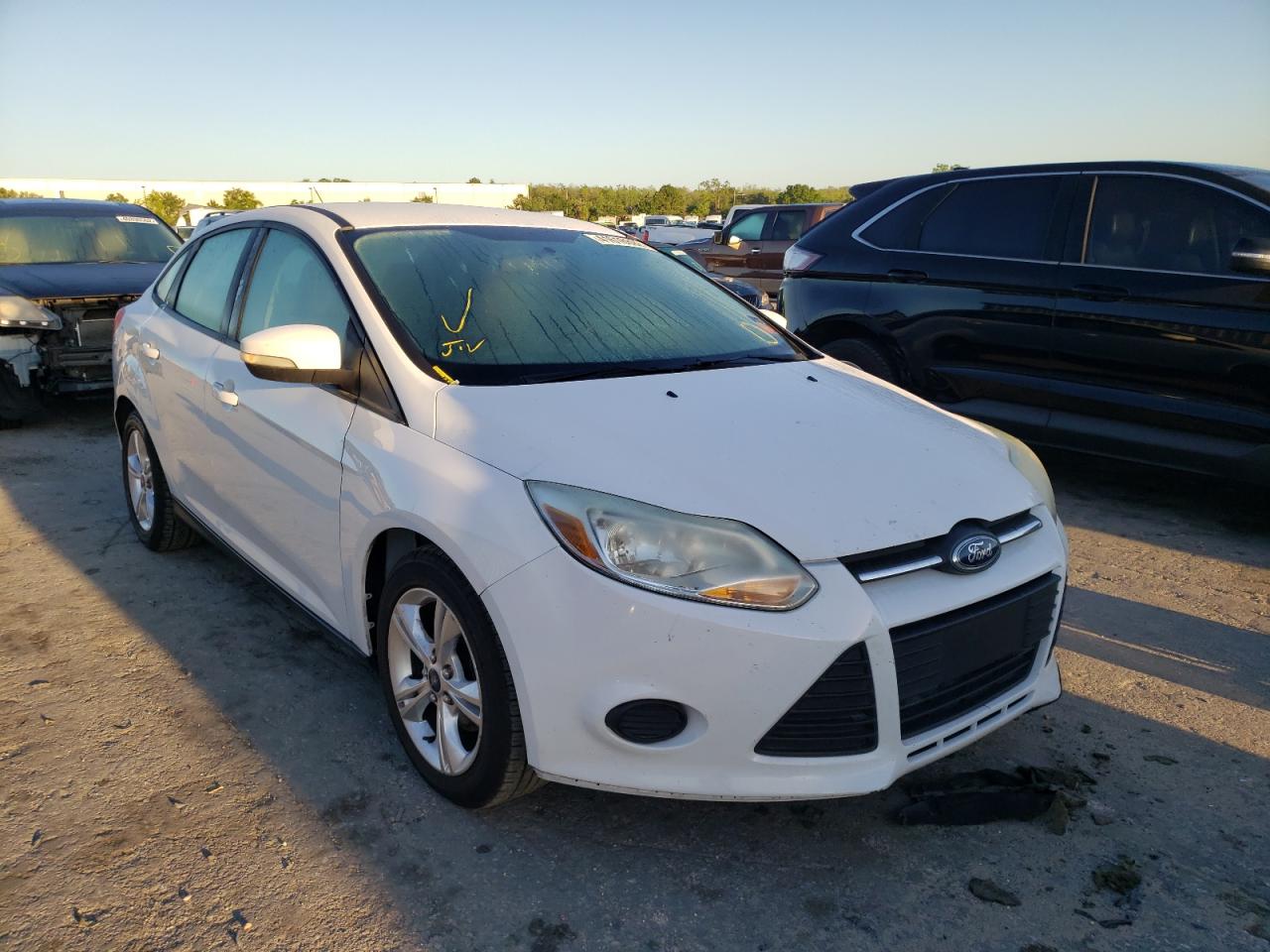 FORD FOCUS SE 2013 with VIN 1FADP3F23DL178387 - Photo from auction