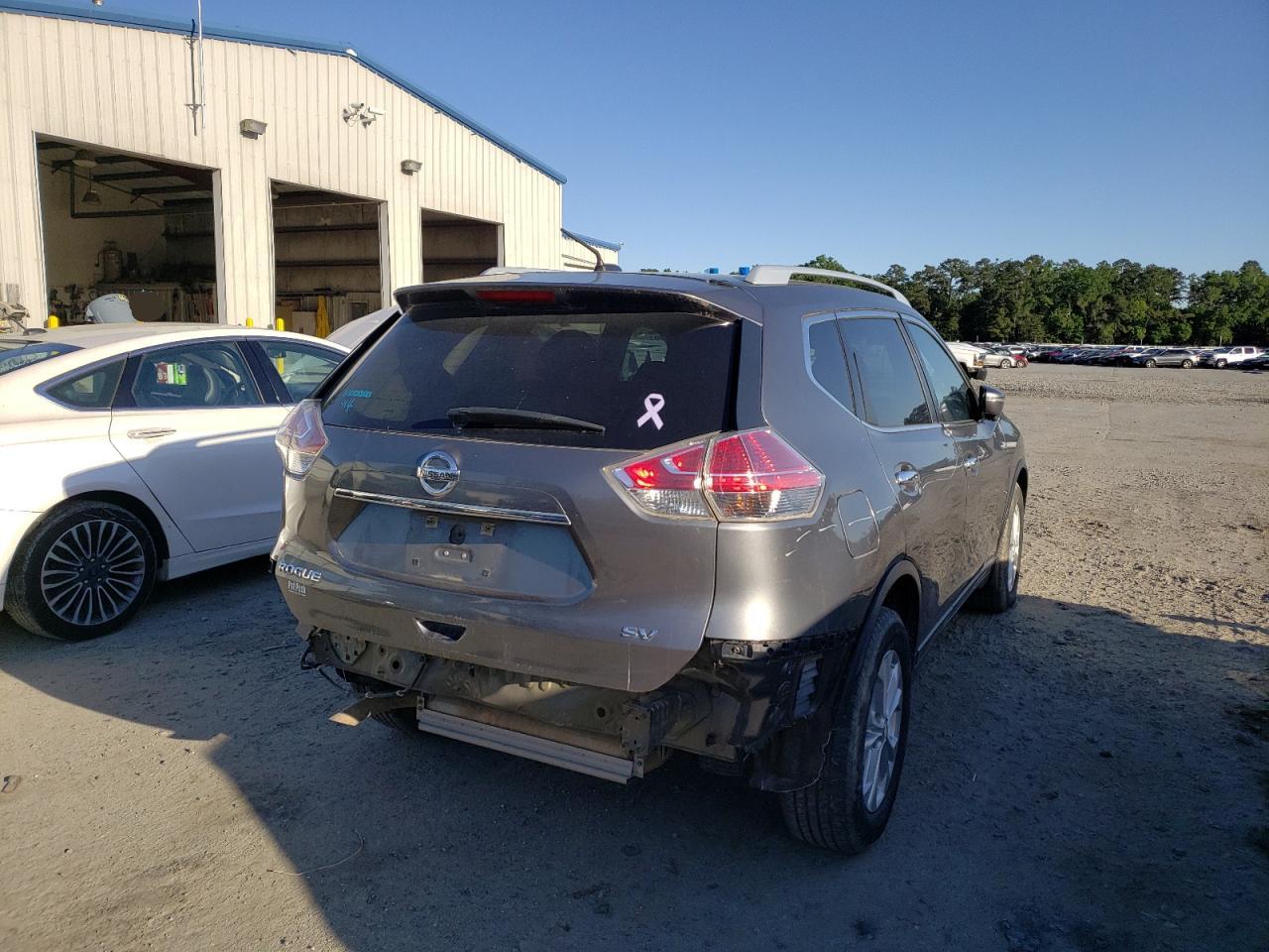 Photo 4 from auction – 2015 NISSAN ROGUE S with VIN 5N1AT2ML0FC902372