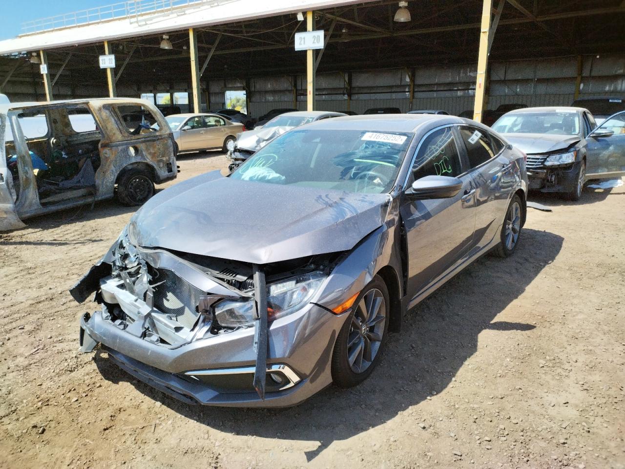 Photo 2 from auction – 2021 HONDA CIVIC EX with VIN 19XFC1F34ME002291