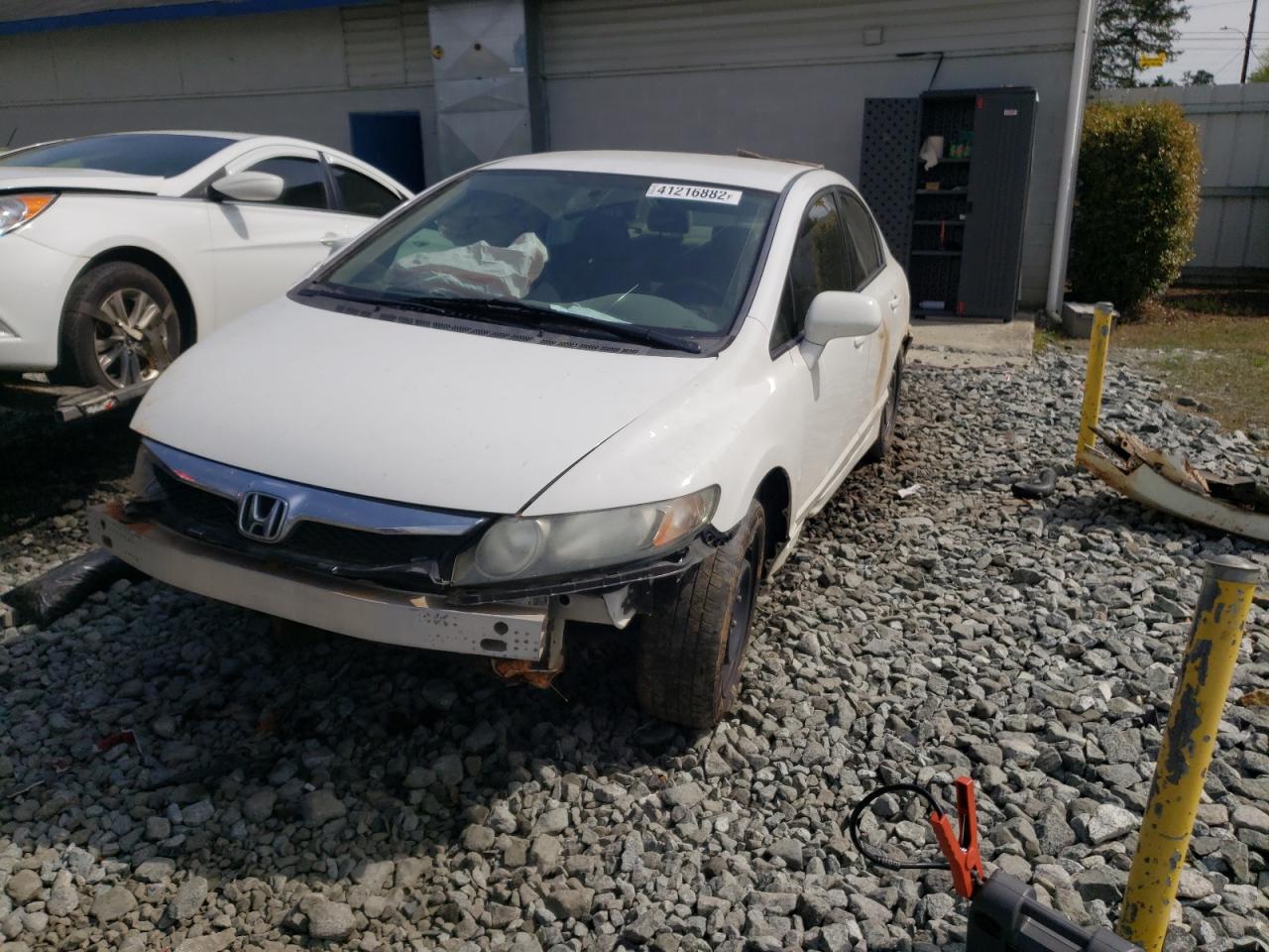 Photo 2 from auction – 2011 HONDA CIVIC LX with VIN 19XFA1F52BE031907