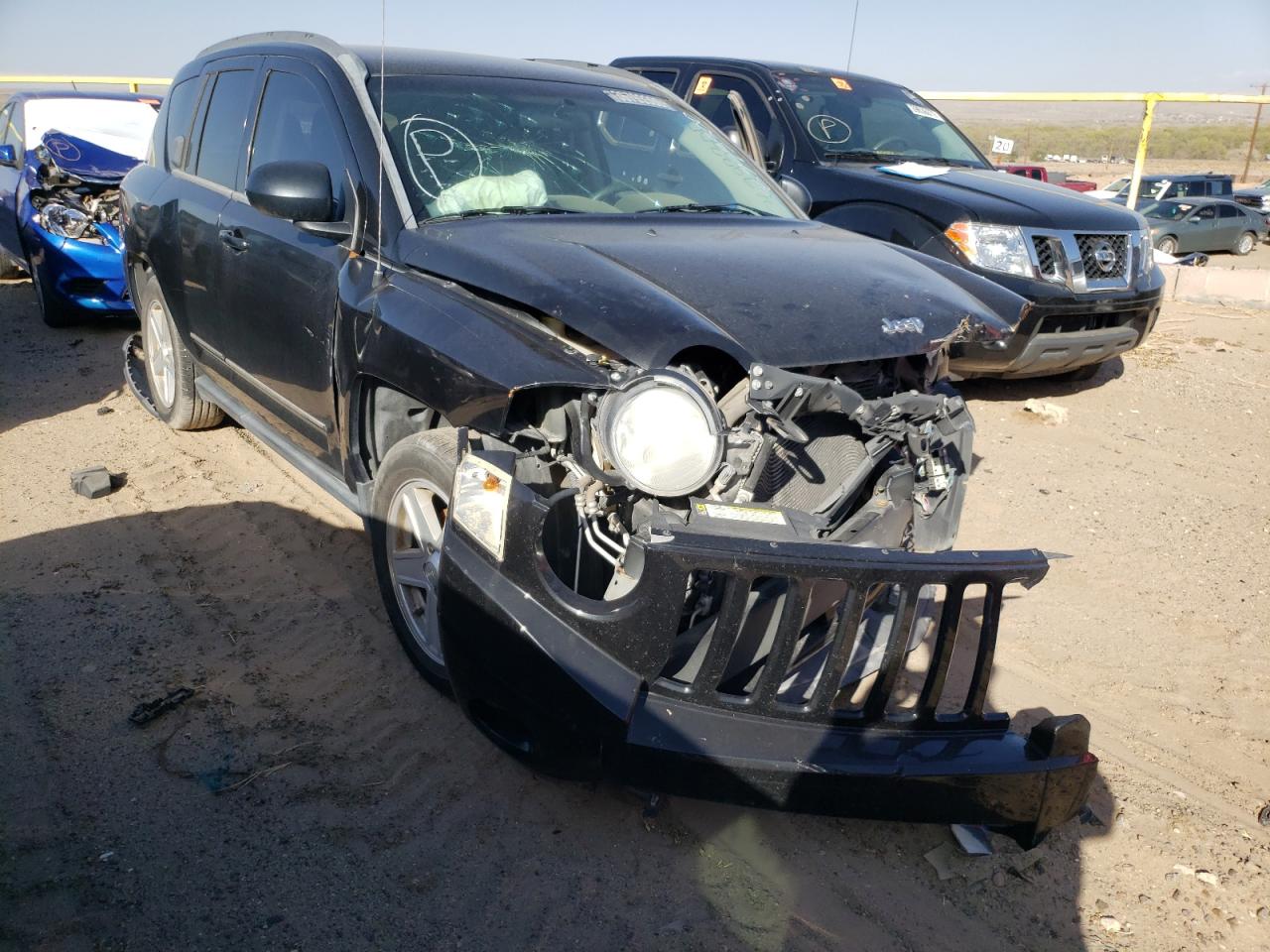 JEEP COMPASS SP 2010 with VIN 1J4NF4FB1AD601538 - Photo from auction