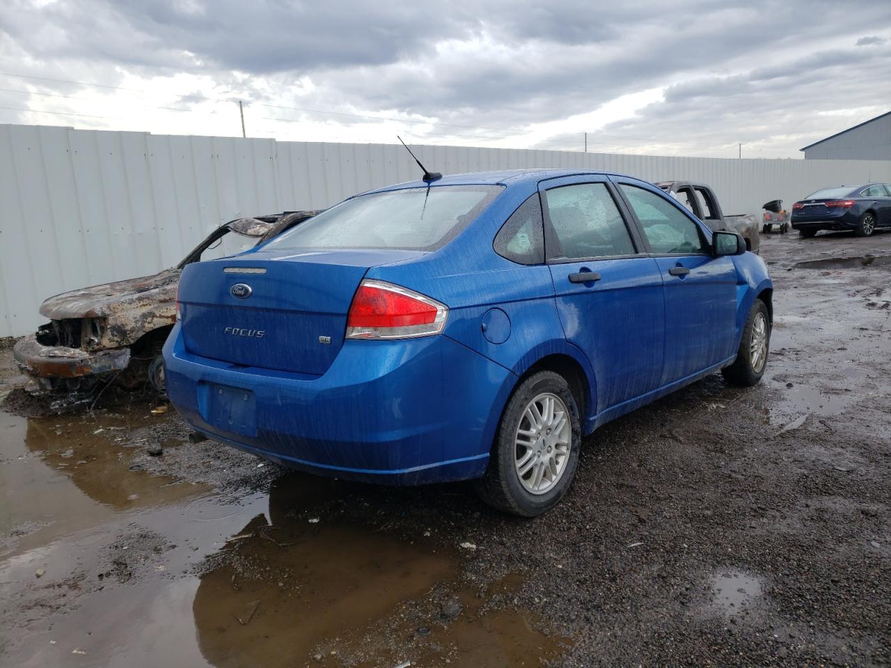 Photo 4 from auction – 2011 FORD FOCUS with VIN 1FAHP3FN2BW119435
