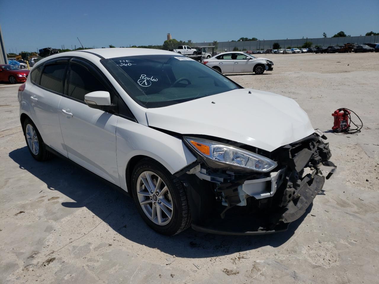 FORD FOCUS SE 2016 with VIN 1FADP3K21GL350314 - Photo from auction