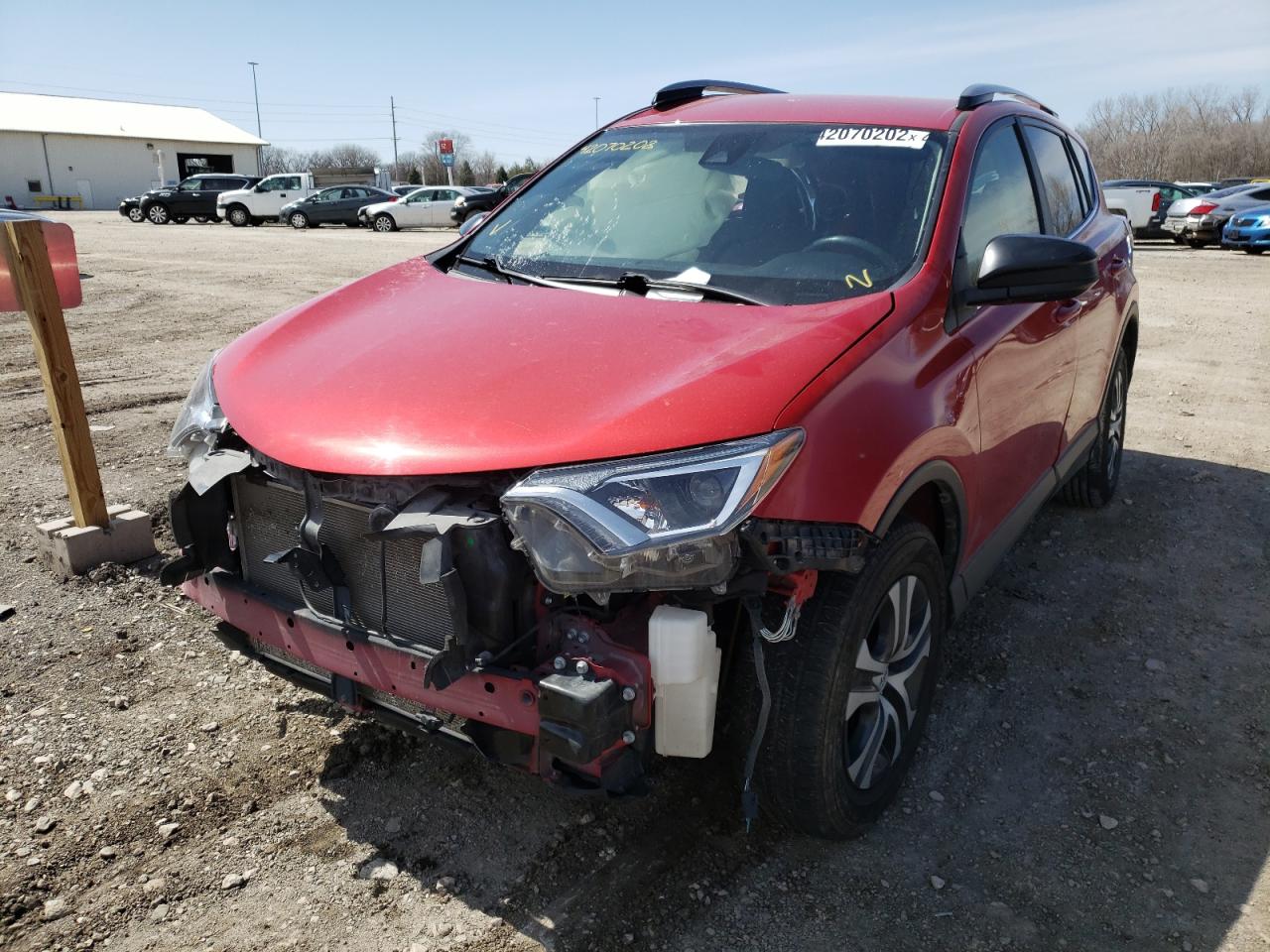 Photo 2 from auction – 2017 TOYOTA RAV4 LE with VIN JTMBFREV1HJ174195