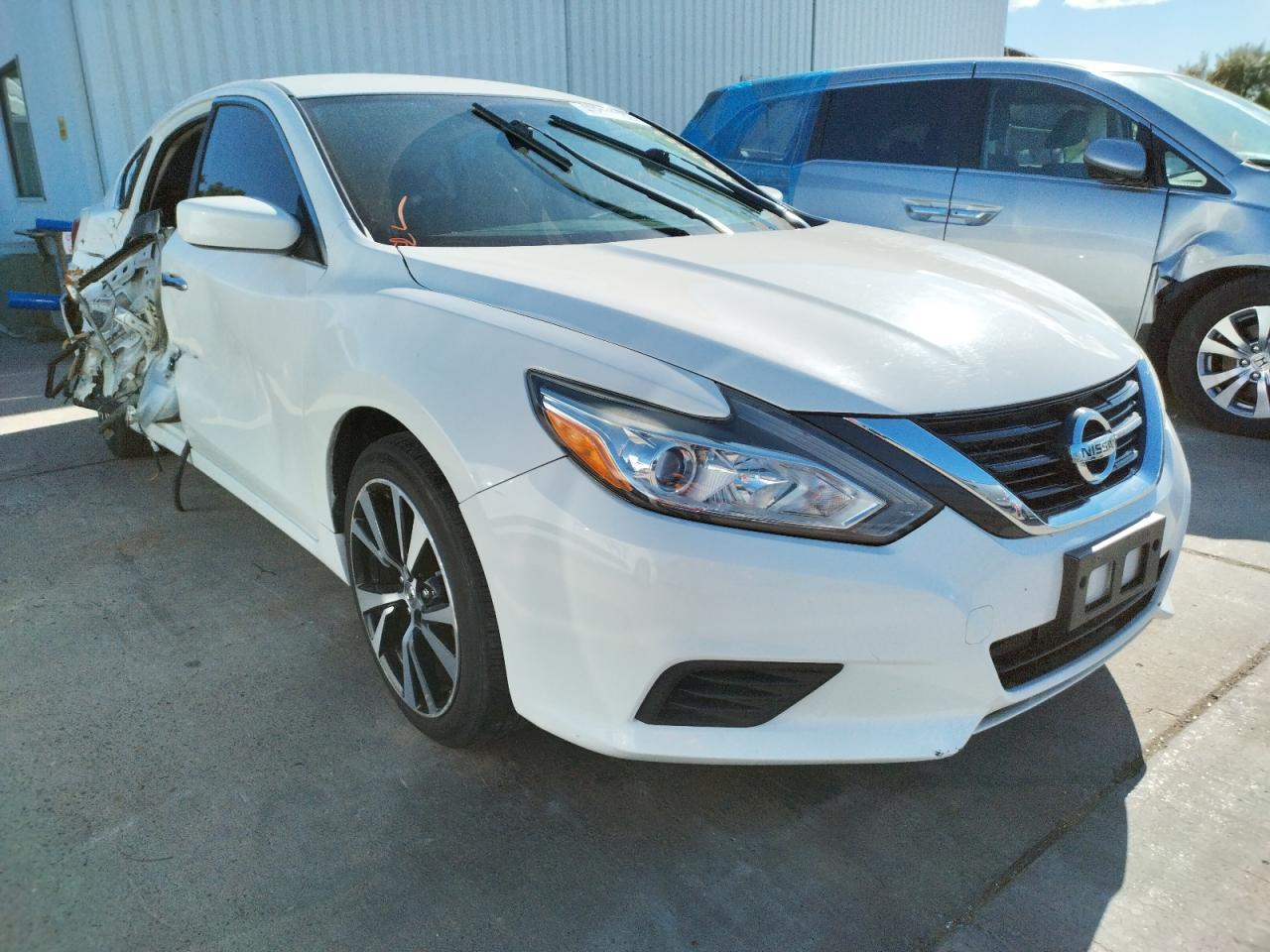 NISSAN ALTIMA 2.5 2016 with VIN 1N4AL3AP5GN359825 - Photo from auction