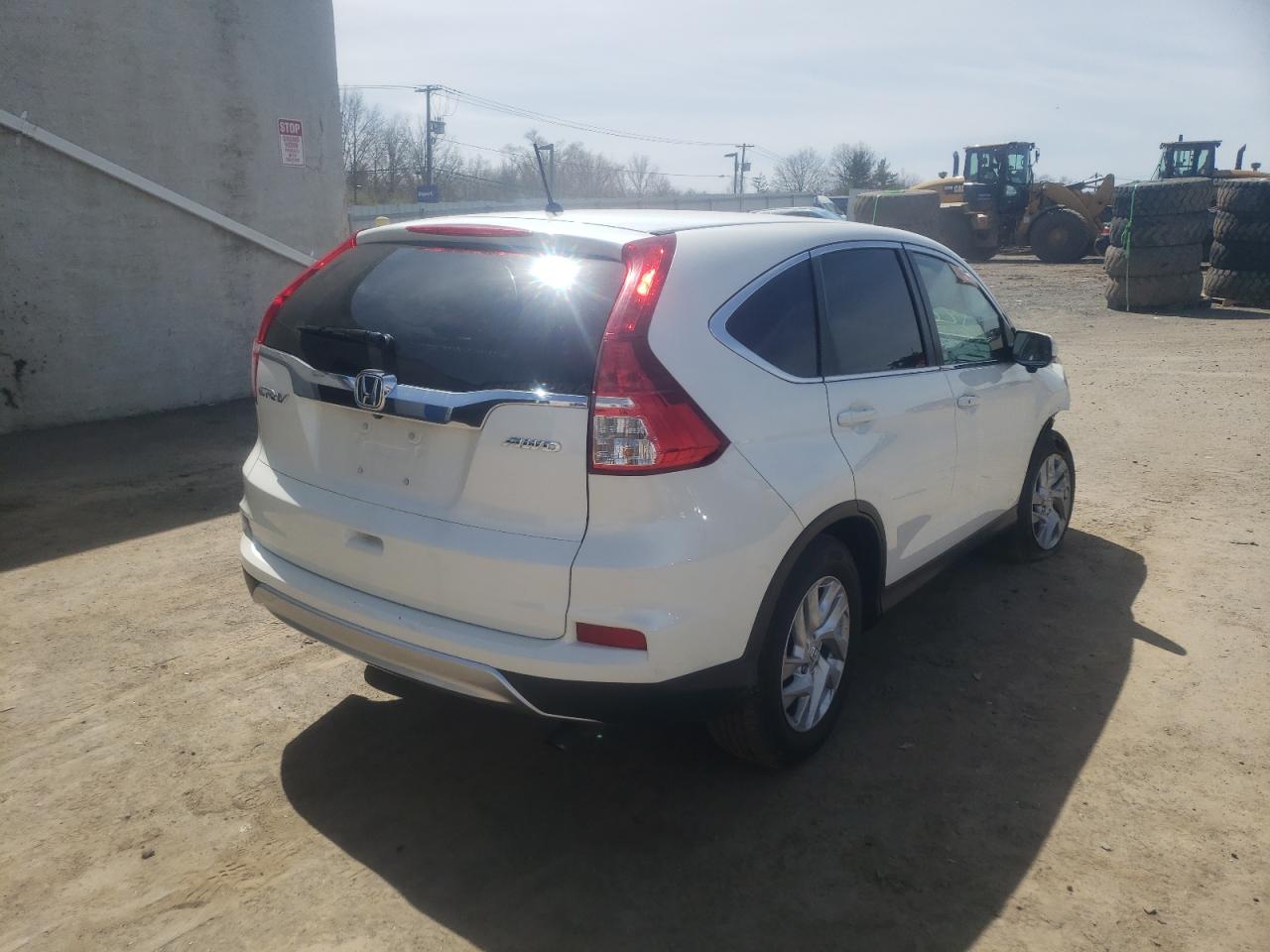 Photo 4 from auction – 2016 HONDA CR-V EX with VIN 5J6RM4H55GL084015