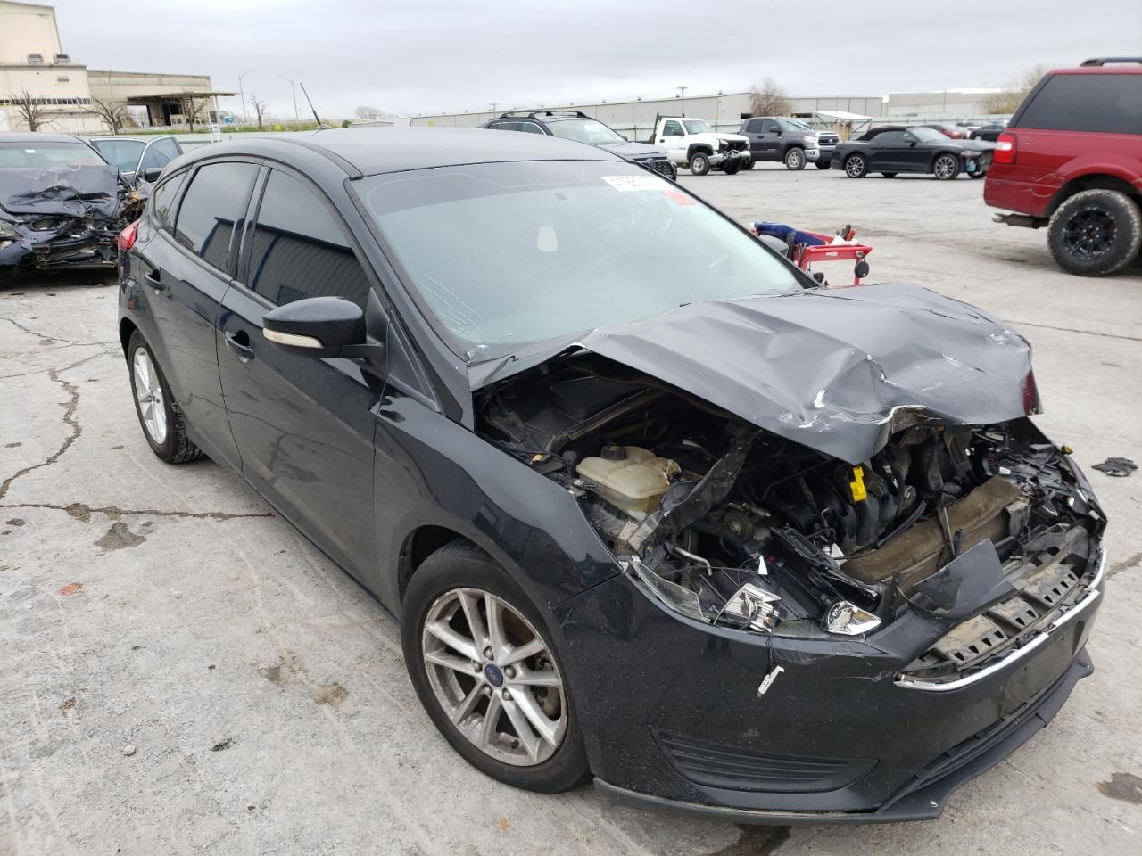 FORD FOCUS SE 2016 with VIN 1FADP3K29GL268573 - Photo from auction