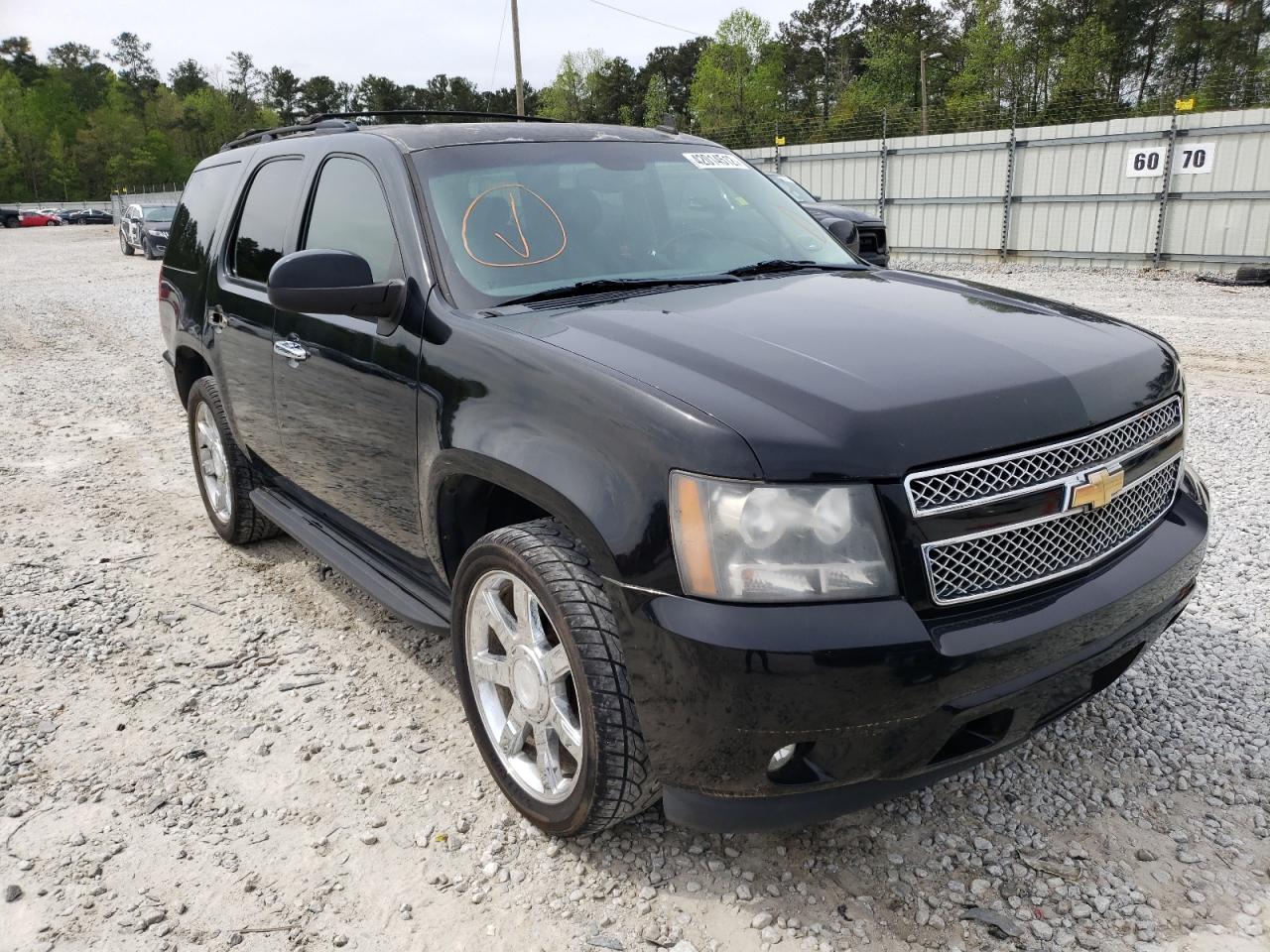 CHEVROLET TAHOE 2010 with VIN 1GNUCCE01AR103757 - Photo from auction