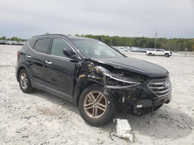 HYUNDAI SANTA FE S 2017 with VIN 5NMZU3LB6HH010828 - Photo from auction